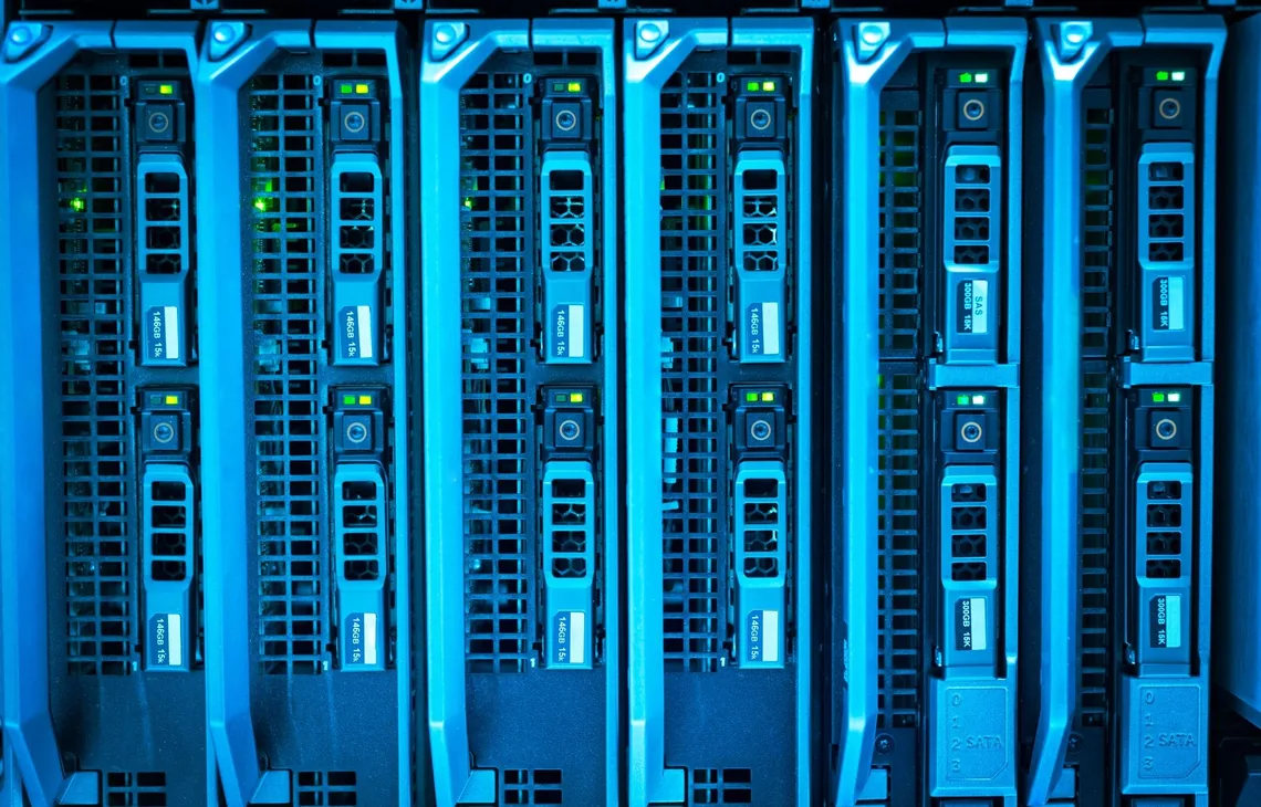 Detailed image of illuminated server racks showcasing modern technology infrastructure.